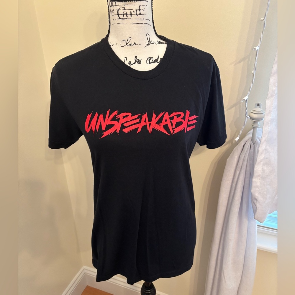 UNSPEAKABLE Official Merch Black Crew Neck T-Shirt with Red lettering